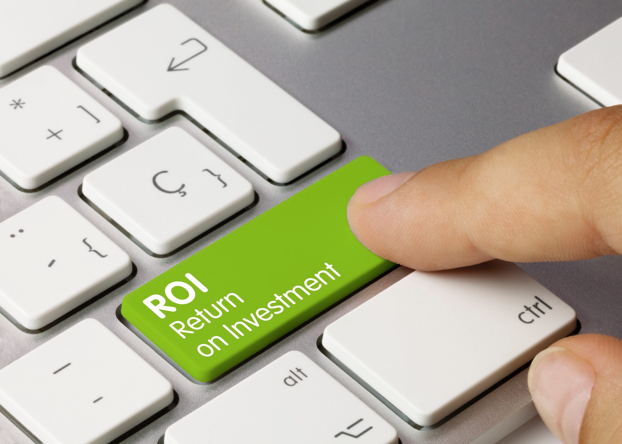 Image of a computer keyboard with "ROI," return on investment, as the "Enter" key.