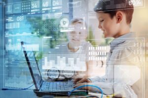 Kids on a laptop with a semi-opaque chart overlay