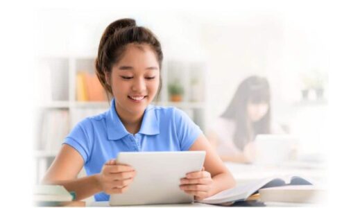 Digital promise report footer image girl with laptop